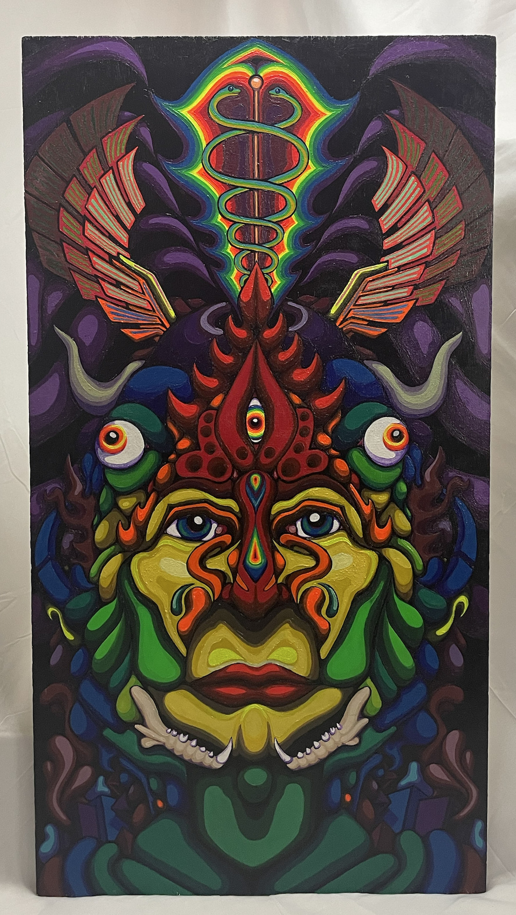 Hermes, a 33.5 by 18 inch UV-reactive acrylic painting on wood panel.