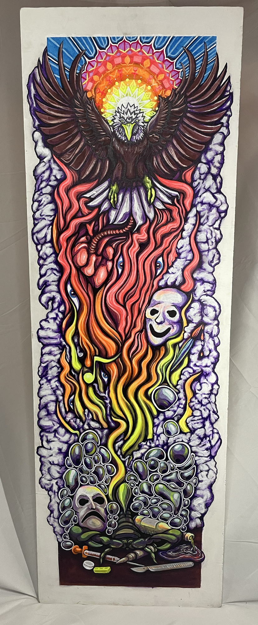 The Rise of Scorpio, a 48 by 16 inch UV-active acrylic painting on gessoed plywood.